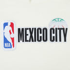 NBA NBA MEXICO CITY GAME 2025 CHANDAIL À CAPUCHON EN MOLLETON À ÉPAULES TOMBANTES POUR HOMME (COQUILLE D'ŒUF)