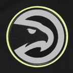 NBA ATLANTA HAWKS UNDER THE LIGHTS T-SHIRT EN JERSEY SIMPLE POUR HOMME (NOIR)
