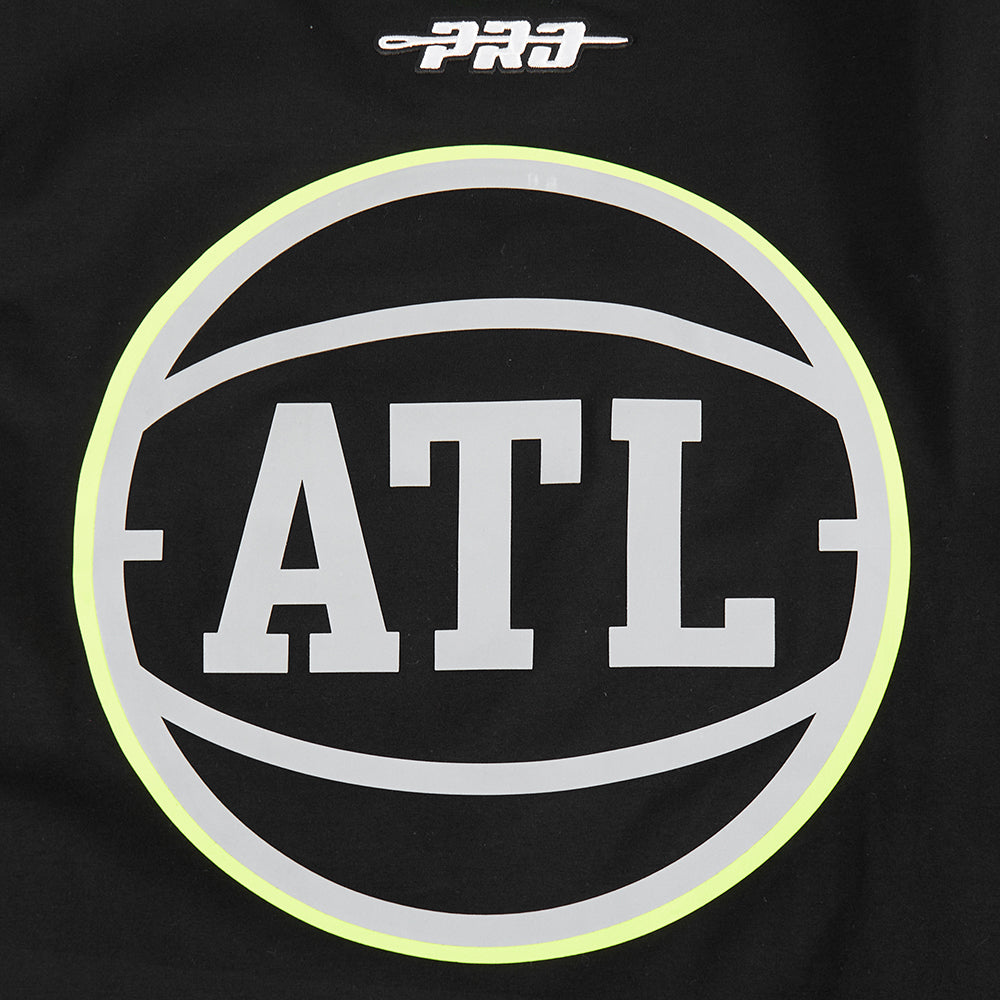 NBA ATLANTA HAWKS UNDER THE LIGHTS T-SHIRT EN JERSEY SIMPLE POUR HOMME (NOIR)