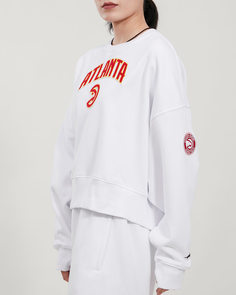 NBA ATLANTA HAWKS CLASSIC CHANDAIL À COL ROND SURDIMENSIONNÉ POUR FEMME (BLANC)