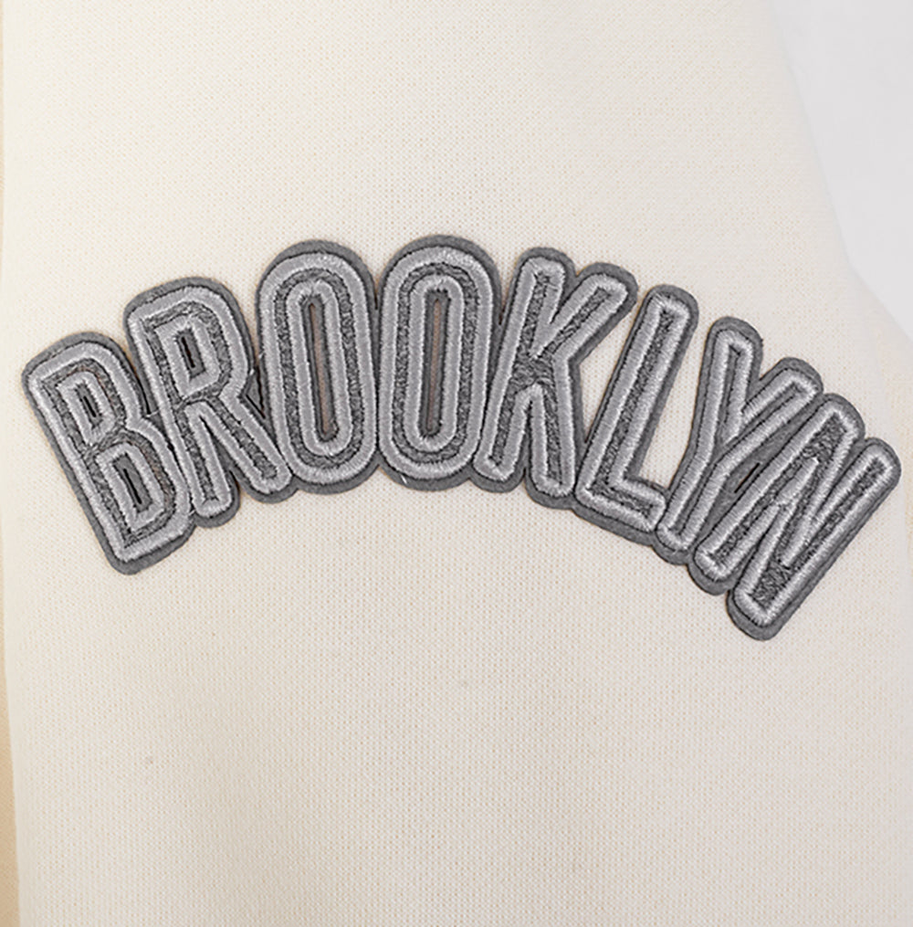 NBA BROOKLYN NETS REVERSE FRENCH TERRY MEN'S DROP SHOULDER FLEECE CREWNECK (EGGSHELL)
