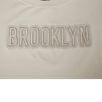 NBA BROOKLYN NETS NEUTRAL WOMEN'S SINGLE JERSEY BOXY TEE (TAUPE)