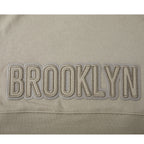 NBA BROOKLYN NETS NEUTRAL WOMEN'S CROPPED PULLOVER HOODIE (TAUPE)