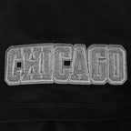 NBA CHICAGO BULLS REVERSE FRENCH TERRY T-SHIRT EN JERSEY DE COTON À ÉPAULES TOMBANTES POUR HOMME (NOIR)