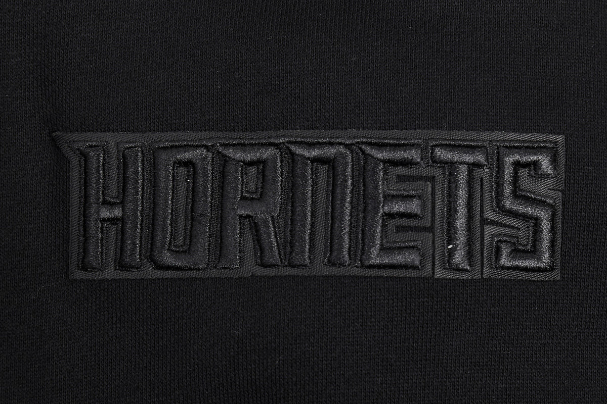 NBA CHARLOTTE HORNETS NEUTRAL CHANDAIL À CAPUCHON À ÉPAULES TOMBANTES POUR HOMME (NOIR)