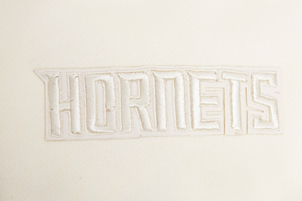 NBA CHARLOTTE HORNETS NEUTRAL CHANDAIL À CAPUCHON À ÉPAULES TOMBANTES POUR HOMME (COQUILLE D'ŒUF)
