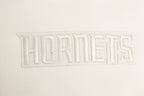 NBA CHARLOTTE HORNETS NEUTRAL CHANDAIL À CAPUCHON À ÉPAULES TOMBANTES POUR HOMME (COQUILLE D'ŒUF)