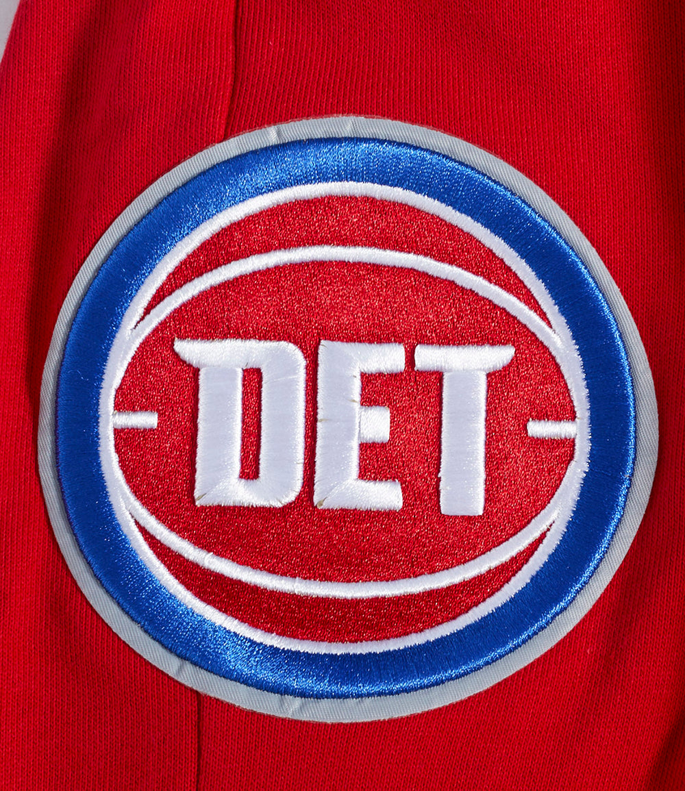 NBA DETROIT PISTONS SCRIPT TAIL PANTALON OUATÉ EN MOLLETON CÔTELÉ POUR HOMME (ROUGE)