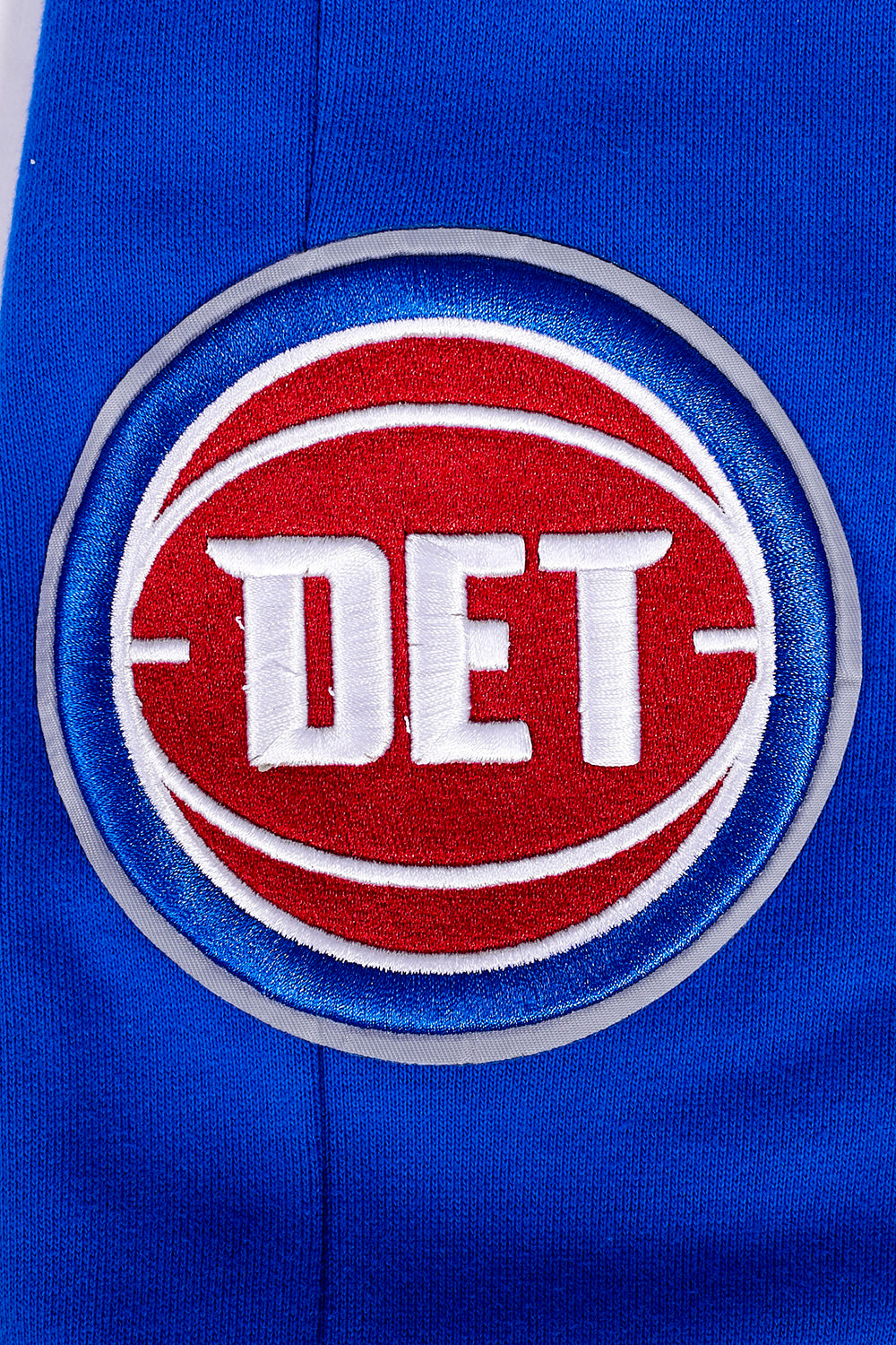 NBA DETROIT PISTONS SCRIPT TAIL MEN'S RIB FLEECE SWEATPANT (ROYAL BLUE/RED)