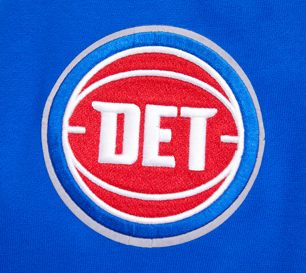 NBA DETROIT PISTONS SCRIPT TAIL CHANDAIL À CAPUCHON EN MOLLETON CÔTELÉ POUR HOMME (BLEU ROYAL/ROUGE)