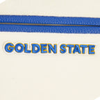 NBA GOLDEN STATE WARRIORS CLASSIC STUDIO BLOUSON COLLÉGIAL POUR GARÇON JUNIOR (COQUILLE D'ŒUF/BLEU ROYAL)