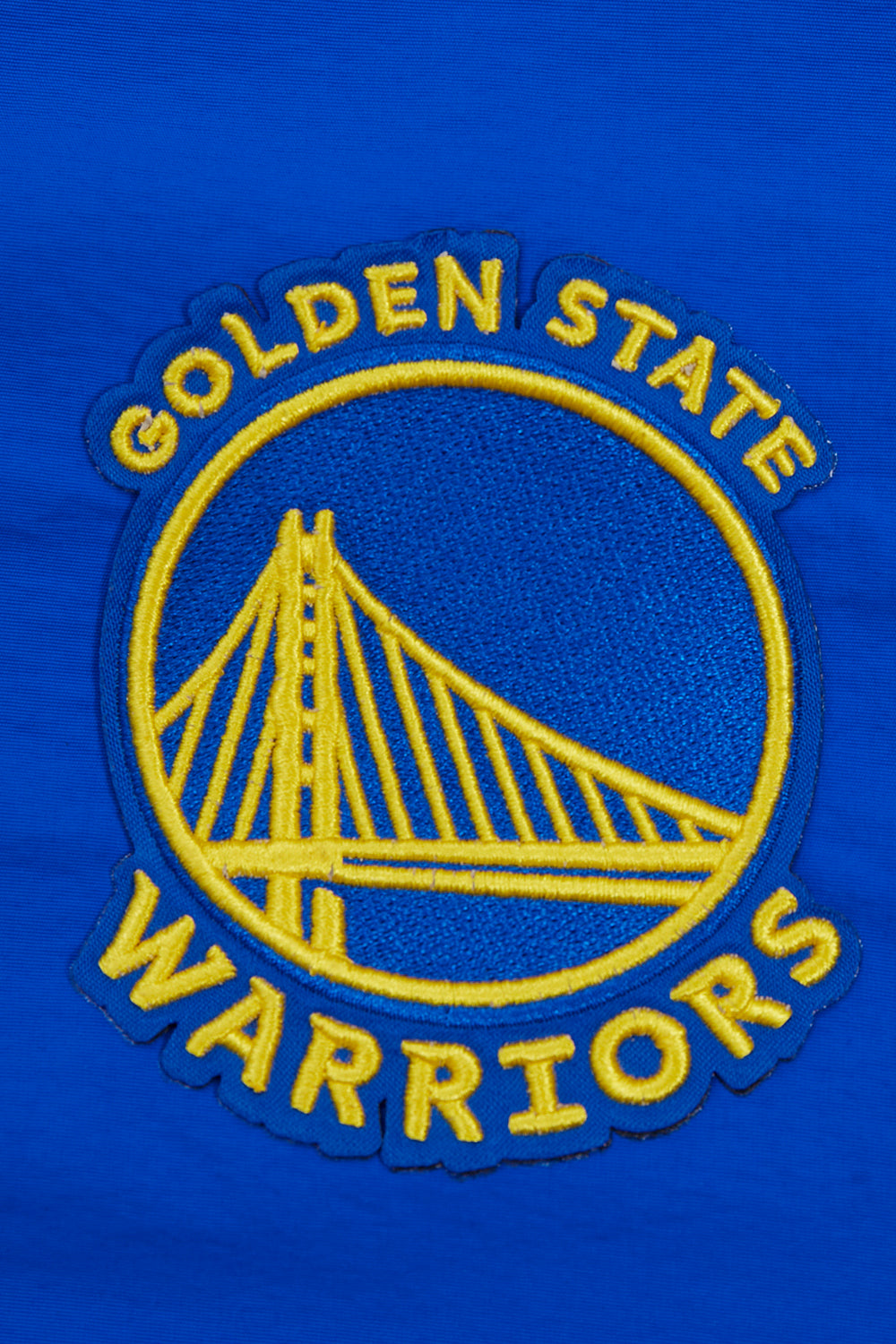 NBA GOLDEN STATE WARRIORS CLASSIC WIND BLOUSON TISSÉ À DEMI-FERMETURE À GLISSIÈRE POUR FEMME (BLEU ROYAL)