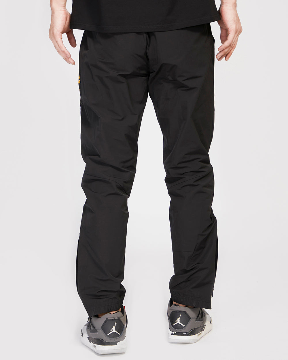 PANTALON TISSÉ HYBRIDE NBA LOS ANGELES LAKERS POUR HOMME (NOIR)