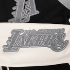 NBA LOS ANGELES LAKERS REVERSE FRENCH TERRY CHANDAIL À CAPUCHON EN MOLLETON À GLISSIÈRE ET À BLOCS DE COULEUR POUR FEMME (NOIR/GRIS/COQUILLE D'ŒUF)