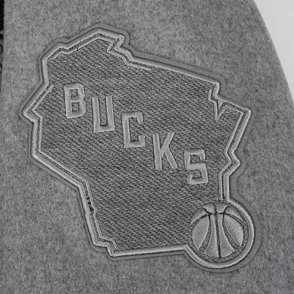 NBA MILWAUKEE BUCKS REVERSE FRENCH TERRY MEN'S VARSITY JACKET (BLACK/GRAY/EGGSHELL)