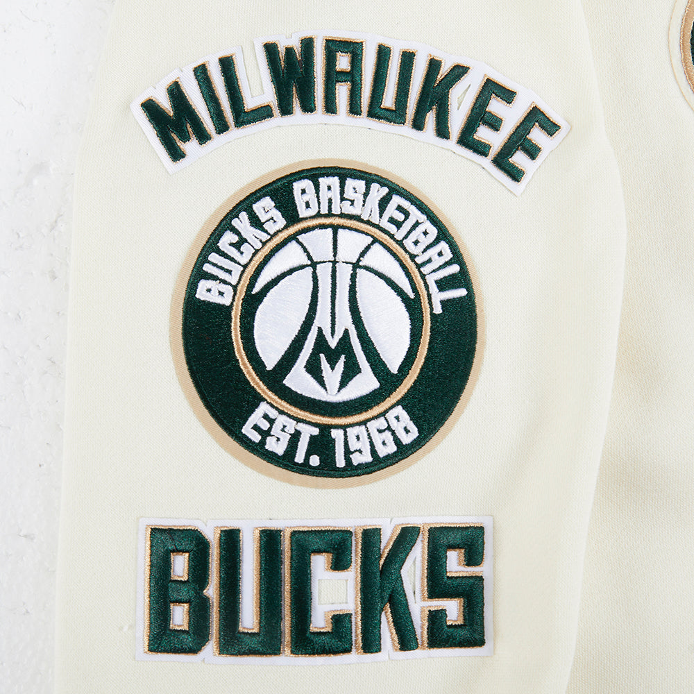 NBA MILWAUKEE BUCKS RETRO CLASSIC CHANDAIL À CAPUCHON EN MOLLETON CÔTELÉ POUR GARÇON JUNIOR (COQUILLE D'ŒUF/NOIR)