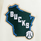 NBA MILWAUKEE BUCKS RETRO CLASSIC CHANDAIL À CAPUCHON EN MOLLETON CÔTELÉ POUR GARÇON JUNIOR (COQUILLE D'ŒUF/NOIR)