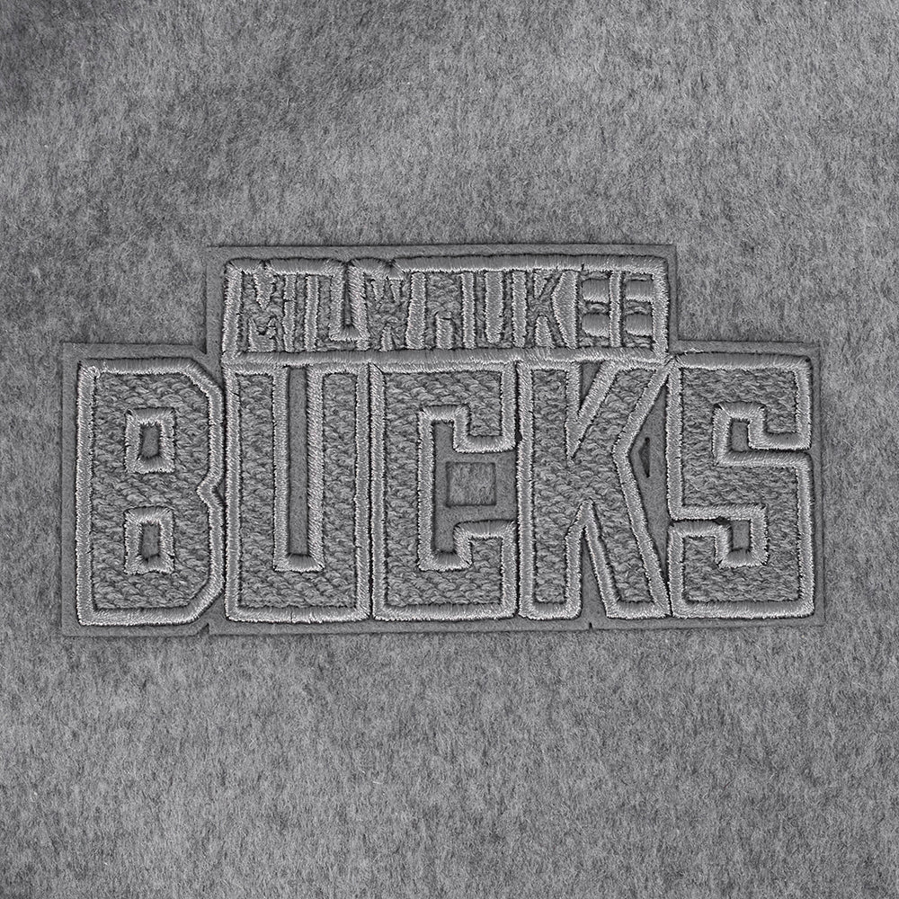 NBA MILWAUKEE BUCKS REVERSE FRENCH TERRY BLOUSON COLLÉGIAL EN LAINE POUR FEMME (NOIR/GRIS/COQUILLE D'ŒUF)