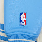 NBA MEMPHIS GRIZZLIES RETRO CLASSIC BLOUSON COLLÉGIAL EN LAINE À BORDS CÔTELÉS POUR GARÇON JUNIOR (COQUILLE D'ŒUF/BLEU UNIVERSITÉ)