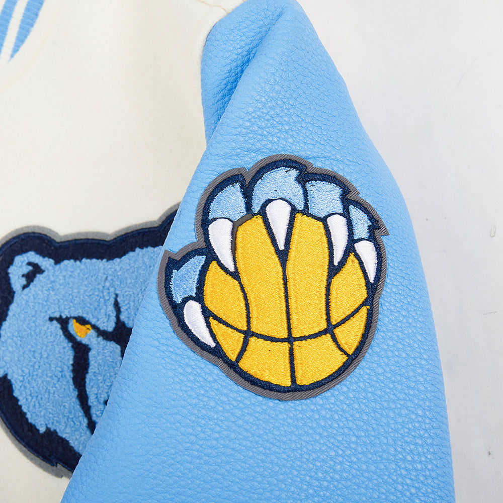 NBA MEMPHIS GRIZZLIES RETRO CLASSIC BLOUSON COLLÉGIAL EN LAINE À BORDS CÔTELÉS POUR GARÇON JUNIOR (COQUILLE D'ŒUF/BLEU UNIVERSITÉ)