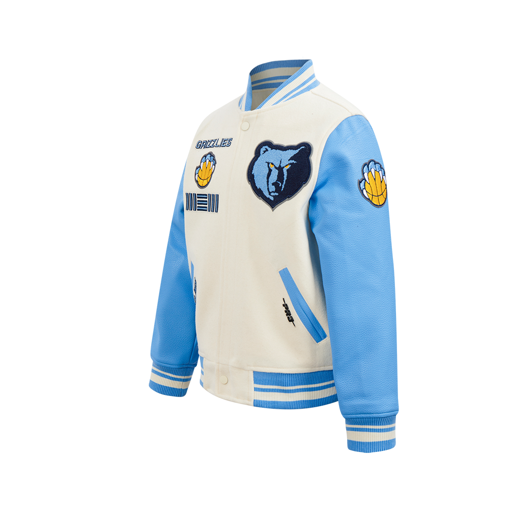 NBA MEMPHIS GRIZZLIES RETRO CLASSIC BLOUSON COLLÉGIAL EN LAINE À BORDS CÔTELÉS POUR GARÇON JUNIOR (COQUILLE D'ŒUF/BLEU UNIVERSITÉ)