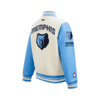 NBA MEMPHIS GRIZZLIES RETRO CLASSIC BLOUSON COLLÉGIAL EN LAINE À BORDS CÔTELÉS POUR GARÇON JUNIOR (COQUILLE D'ŒUF/BLEU UNIVERSITÉ)