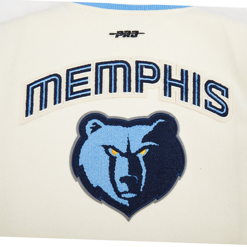 NBA MEMPHIS GRIZZLIES RETRO CLASSIC BLOUSON COLLÉGIAL EN LAINE À BORDS CÔTELÉS POUR GARÇON JUNIOR (COQUILLE D'ŒUF/BLEU UNIVERSITÉ)