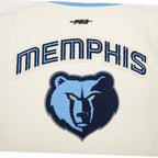 NBA MEMPHIS GRIZZLIES RETRO CLASSIC BLOUSON COLLÉGIAL EN LAINE À BORDS CÔTELÉS POUR GARÇON JUNIOR (COQUILLE D'ŒUF/BLEU UNIVERSITÉ)