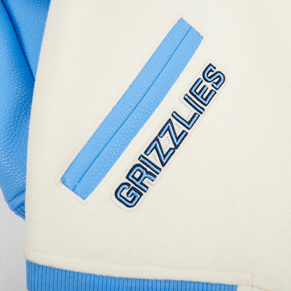 NBA MEMPHIS GRIZZLIES RETRO CLASSIC BLOUSON COLLÉGIAL EN LAINE À BORDS CÔTELÉS POUR GARÇON JUNIOR (COQUILLE D'ŒUF/BLEU UNIVERSITÉ)