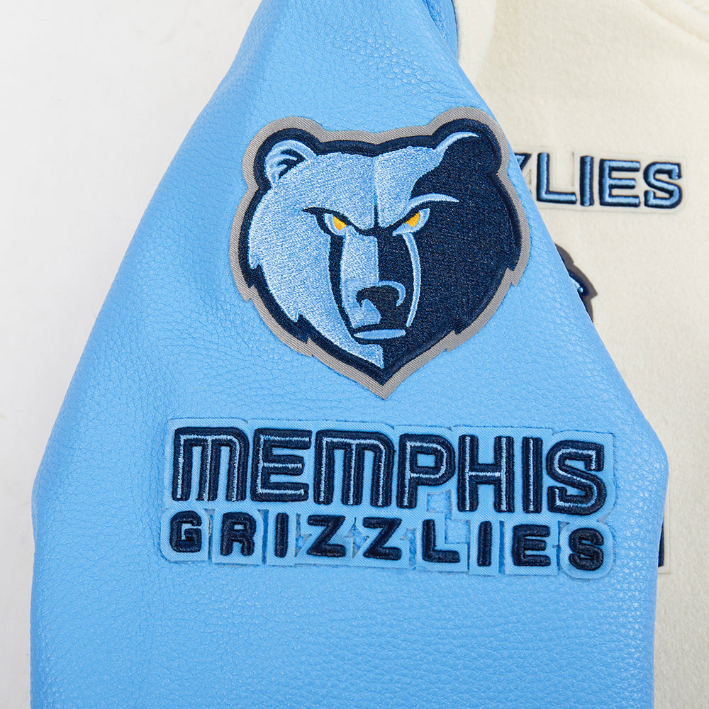 NBA MEMPHIS GRIZZLIES RETRO CLASSIC BLOUSON COLLÉGIAL EN LAINE À BORDS CÔTELÉS POUR GARÇON JUNIOR (COQUILLE D'ŒUF/BLEU UNIVERSITÉ)