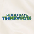 NBA MINNESOTA TIMBERWOLVES BEST OF BLOUSON EN SATIN À BORDS CÔTELÉS POUR HOMME (COQUILLE D'ŒUF/MARINE MINUIT)