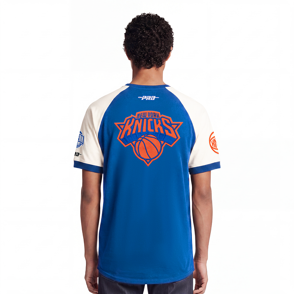 NBA NEW YORK KNICKS FIRST TEAM MEN'S RAGLAN TEE (EGGSHELL/ROYAL BLUE)