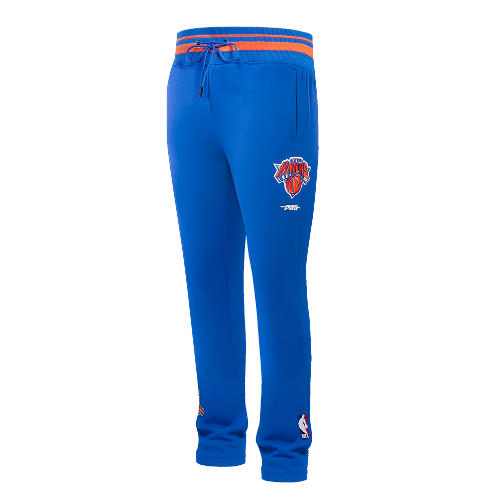 NBA NEW YORK KNICKS SCRIPT TAIL PANTALON OUATÉ EN MOLLETON CÔTELÉ POUR HOMME (BLEU ROYAL/ORANGE/BLEU ROYAL)