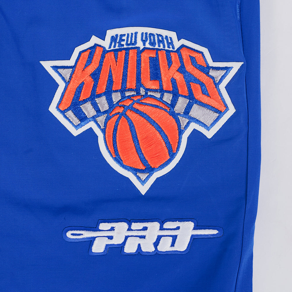 NBA NEW YORK KNICKS CLASSIC WIND SUIT PANTALON TISSÉ POUR HOMME (BLEU ROYAL)