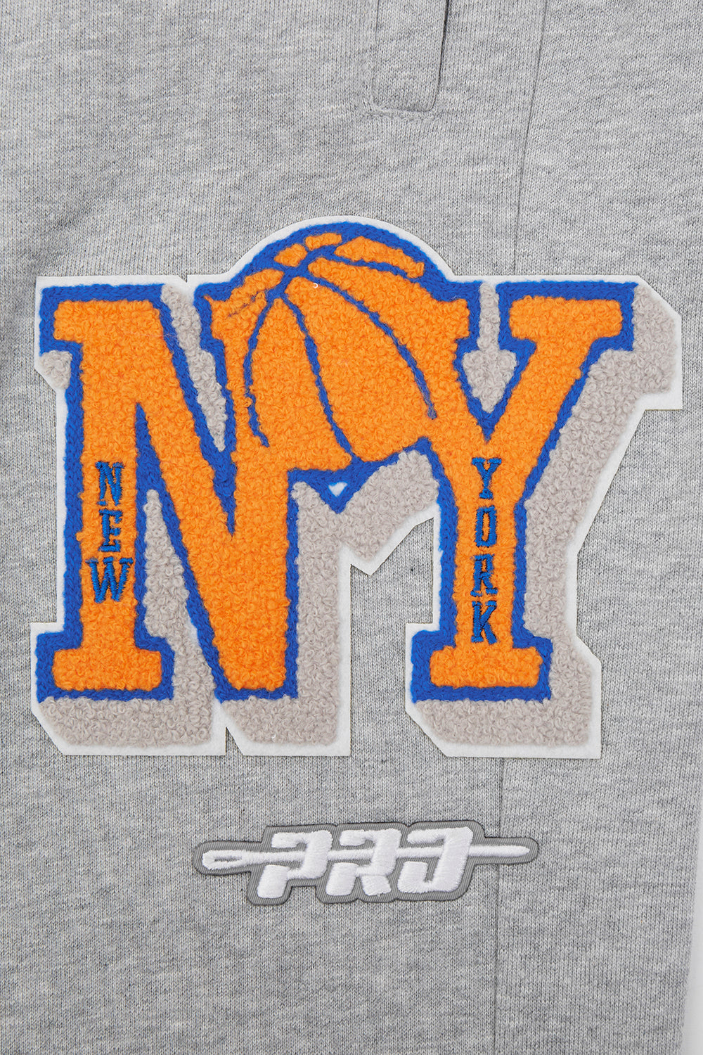 NBA NEW YORK KNICKS PANTALON OUATÉ MASHUP CÔTELÉ POUR HOMME (GRIS CHINÉ/BLEU ROYAL/ORANGE)