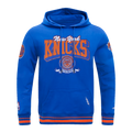 NBA NEW YORK KNICKS TEAM BADGE CHANDAIL À CAPUCHON EN MOLLETON CÔTELÉ POUR HOMME (BLEU ROYAL/ORANGE/BLEU ROYAL)