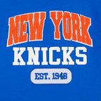 NBA NEW YORK KNICKS CITY ARCH HAUT EN MOLLETON À GLISSIÈRE AU QUART POUR HOMME (BLEU ROYAL)