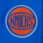 NBA NEW YORK KNICKS CITY ARCH HAUT EN MOLLETON À GLISSIÈRE AU QUART POUR HOMME (BLEU ROYAL)