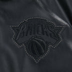 NBA NEW YORK KNICKS BLACKOUT MEN'S LEATHER VARSITY JACKET (JET BLACK)