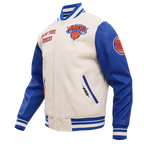 NBA NEW YORK KNICKS RETRO CLASSIC MEN'S RIB WOOL VARSITY JACKET (EGGSHELL/ ROYAL BLUE)
