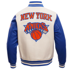 NBA NEW YORK KNICKS RETRO CLASSIC MEN'S RIB WOOL VARSITY JACKET (EGGSHELL/ ROYAL BLUE)