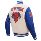 NBA NEW YORK KNICKS RETRO CLASSIC MEN'S RIB WOOL VARSITY JACKET (EGGSHELL/ ROYAL BLUE)