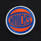 NBA NEW YORK KNICKS CLASSIC T-SHIRT EN JERSEY SIMPLE À COUPE AJUSTÉE POUR FEMME (NOIR)