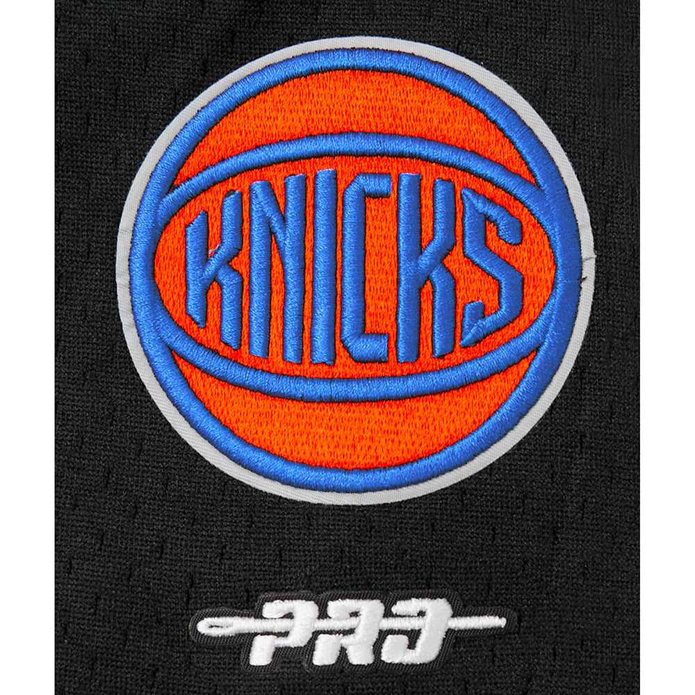 NBA NEW YORK KNICKS CLASSIC CHEMISE BOUTONNÉE EN FILET POUR GARÇON JUNIOR (NOIR/ORANGE)