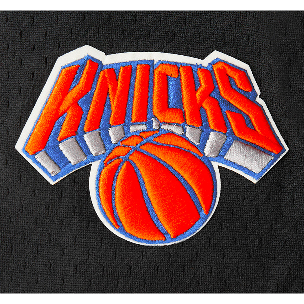 NBA NEW YORK KNICKS CLASSIC CHEMISE BOUTONNÉE EN FILET POUR GARÇON JUNIOR (NOIR/ORANGE)