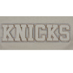 NBA NEW YORK KNICKS NEUTRAL T-SHIRT À MANCHES COURTES ET À COUPE CARRÉE POUR FILLE JUNIOR (TAUPE)