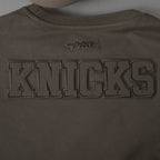 NBA NEW YORK KNICKS NEUTRAL CHANDAIL À COL ROND EN MOLLETON POUR FILLE JUNIOR (TAUPE FONCÉ)