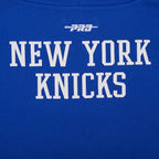 NBA NEW YORK KNICKS CHANDAIL À CAPUCHON DU CHAMPIONNAT 2026 COURT POUR FEMME (BLEU ROYAL/ORANGE/BLEU ROYAL)