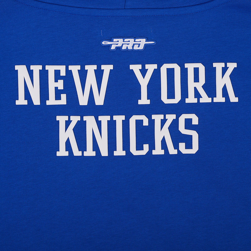 NBA NEW YORK KNICKS CHANDAIL À CAPUCHON DU CHAMPIONNAT 2026 COURT POUR FEMME (BLEU ROYAL/ORANGE/BLEU ROYAL)
