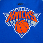 NBA NEW YORK KNICKS RETRO CLASSIC BLOUSON COLLÉGIAL EN LAINE À BORDS CÔTELÉS POUR FEMME (BLEU ROYAL/ORANGE/BLEU ROYAL)